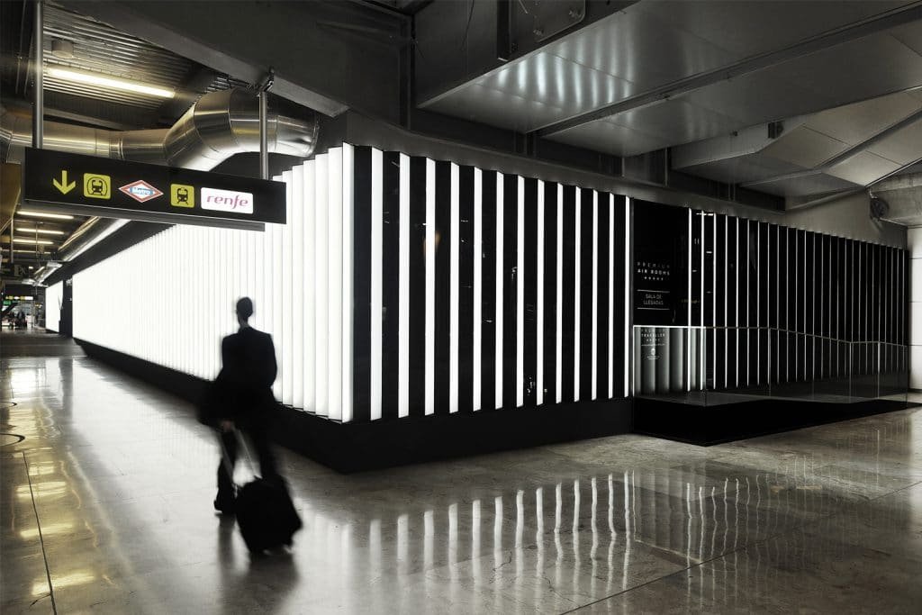 Air Rooms illuminated facade inside Madrid-Barajas Airport Terminal 4