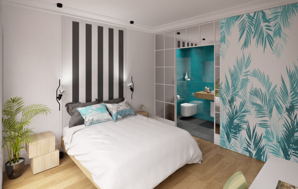 FIVE Urban Stay guest room interior by Indy Blue Studio, featuring a tropical patterned partition, turquoise bathroom, natural wood flooring and contemporary hotel furniture